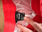 The North Face brand tag, women's size M