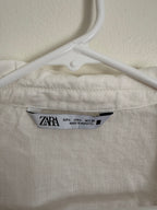 Zara brand tag, size L