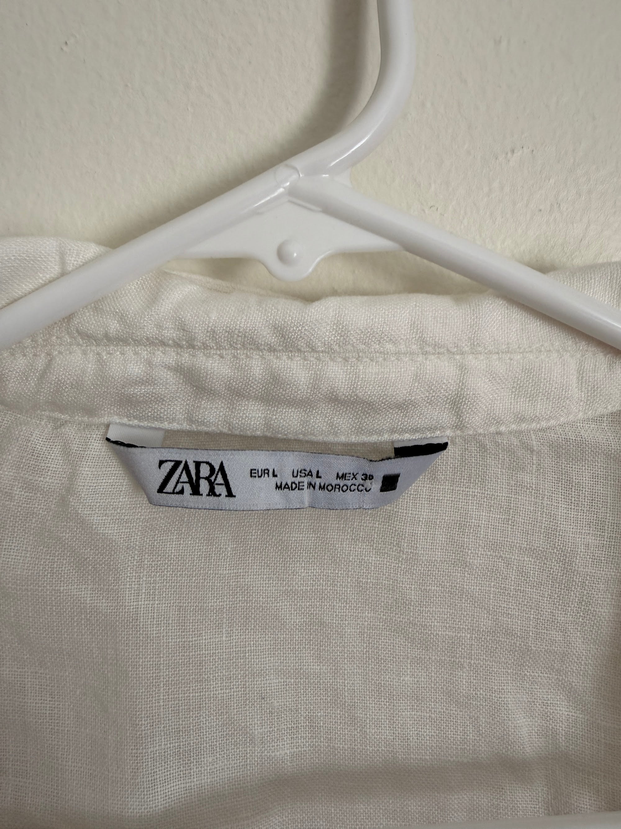 Zara brand tag, size L