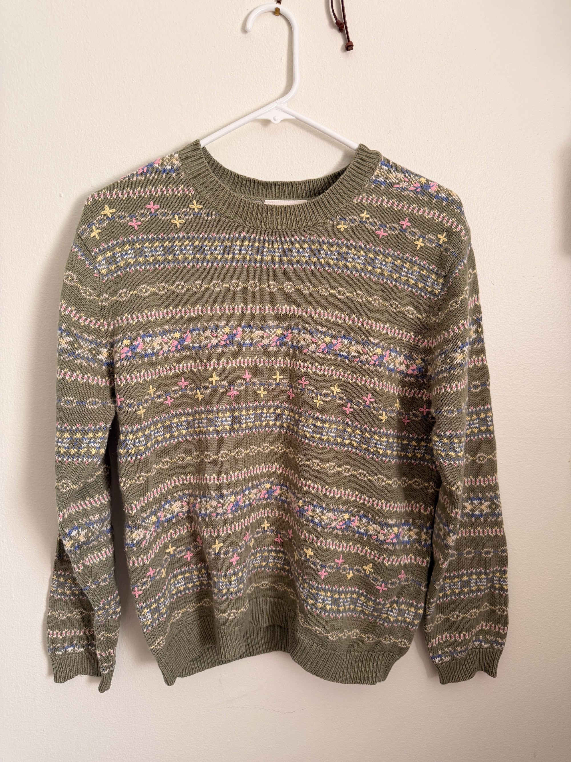 Green knit sweater, front view